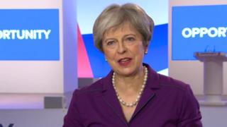 Theresa May speaking from Conservative Party conference